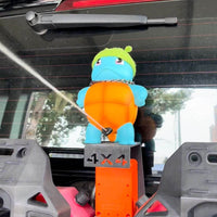 Figurína s rozprašovačem Auto — Proud vody, který se usmívá 